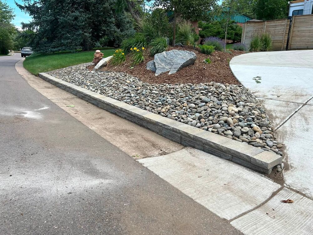 River rock bed along driveway